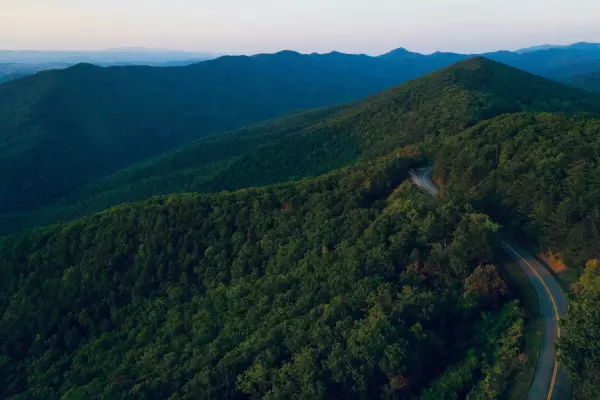 Weekend Getaways in North Carolina Photo by <a href="https://unsplash.com/@mitchkmetz?utm_content=creditCopyText&utm_medium=referral&utm_source=unsplash">Mitchell Kmetz</a> on <a href="https://unsplash.com/photos/aerial-view-of-forest-d7Qn3lHTn24?utm_content=creditCopyText&utm_medium=referral&utm_source=unsplash">Unsplash</a>
      