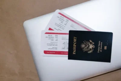 Photo by RDNE Stock project: https://www.pexels.com/photo/close-up-shot-of-a-passport-and-tickets-on-top-of-a-laptop-7310015/ flight booking sites